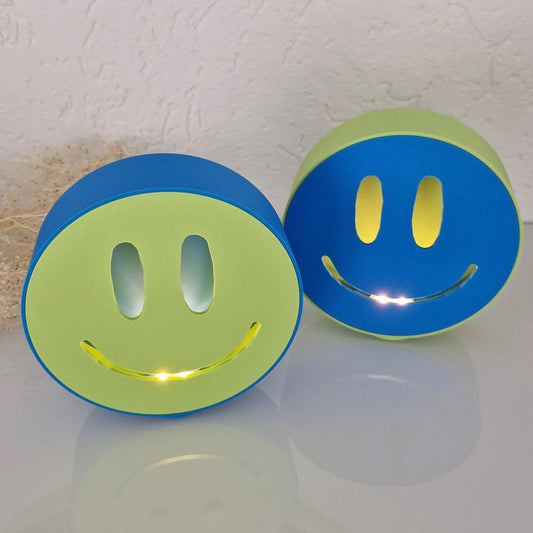 Leuchtende Smileys TK-Welt